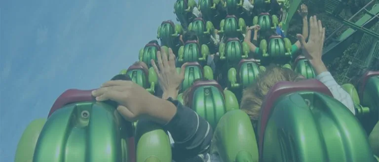 People on a roller coaster ride