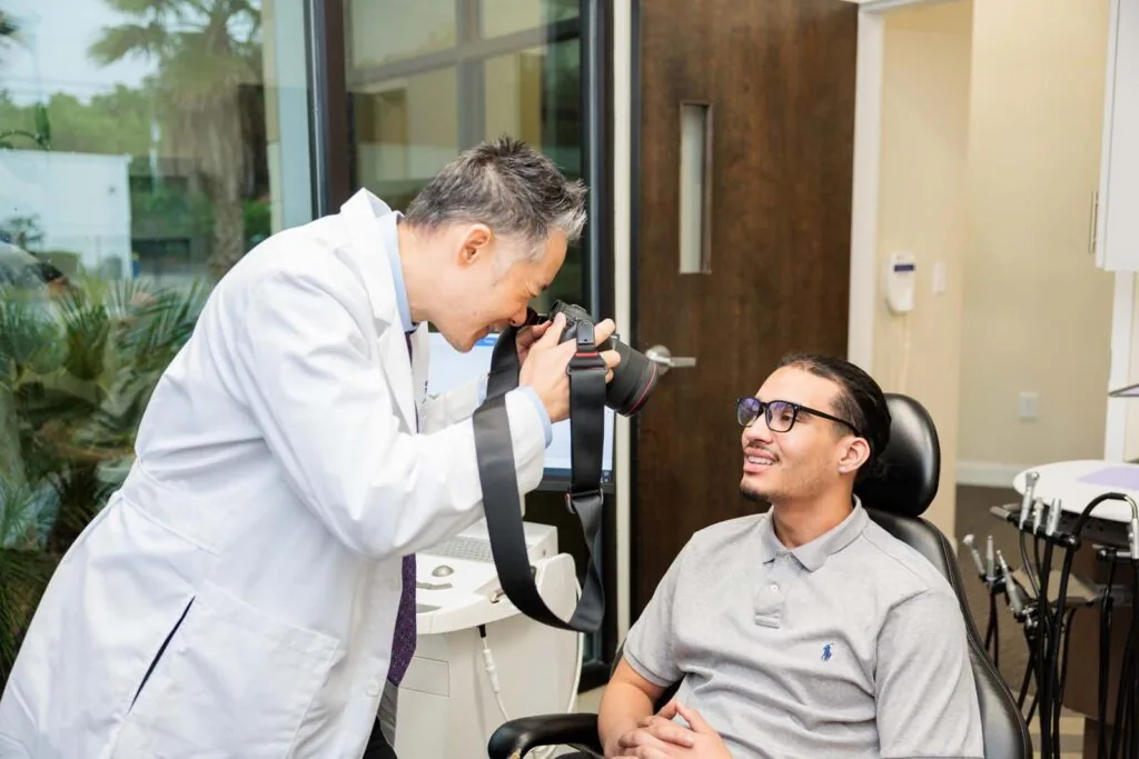 Dentist taking a picture of patient